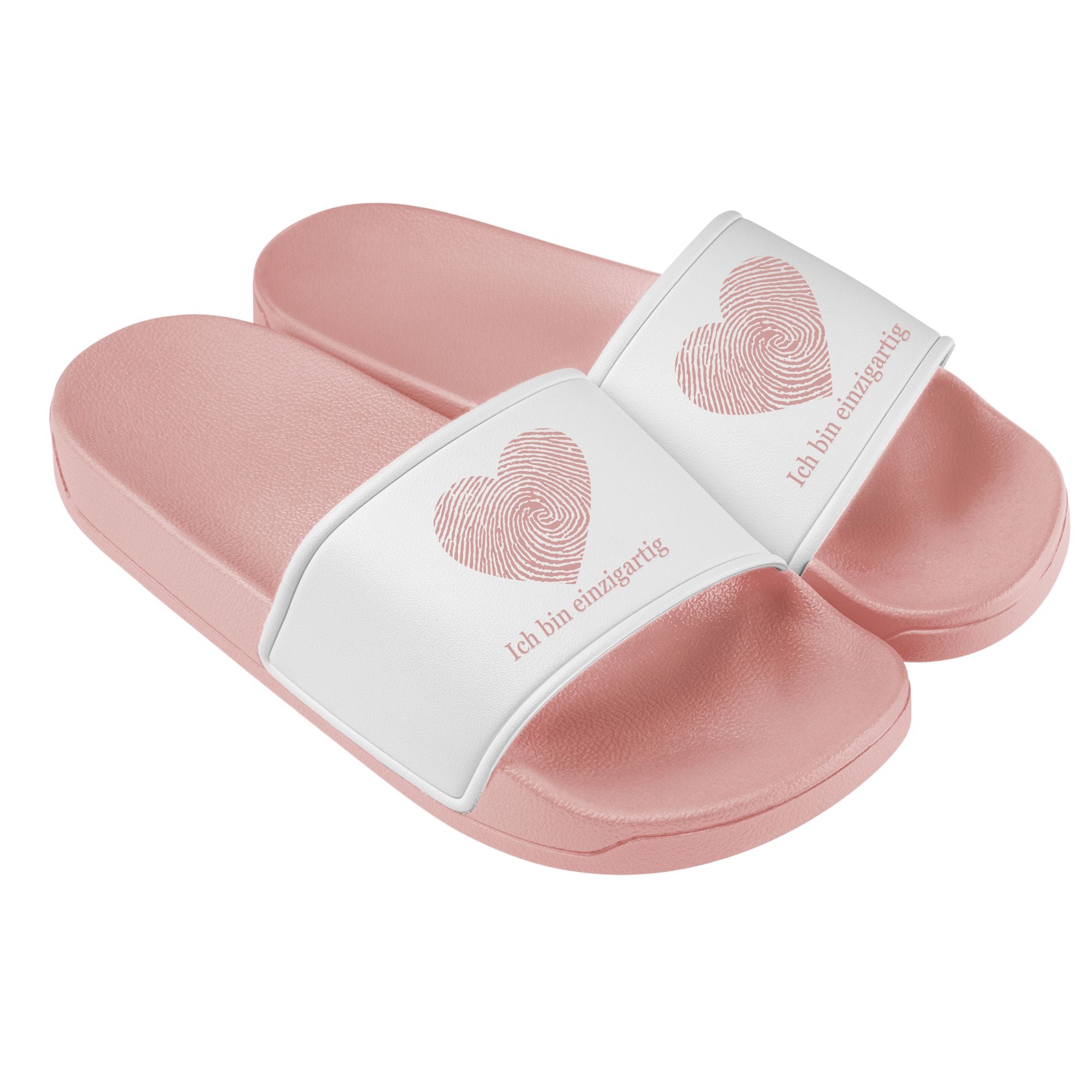 Pinke Badelatschen mit pinkenHerz-Fingerabdruck und der Aufschrift ‚Ich bin einzigartig‘ – schlichtes, starkes Design für selbstbewusste Kinder und Erwachsene