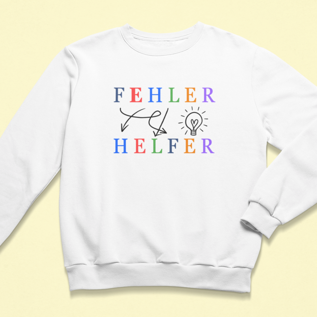 weißer Kinder-Achtsamkeitssweatshirt mit der Botschaft „Fehler – Helfer“. Farbige Buchstaben, kreative Icons und kindgerechte Aussage – ideal für Schulstart, Mutmacher oder Geschenk.