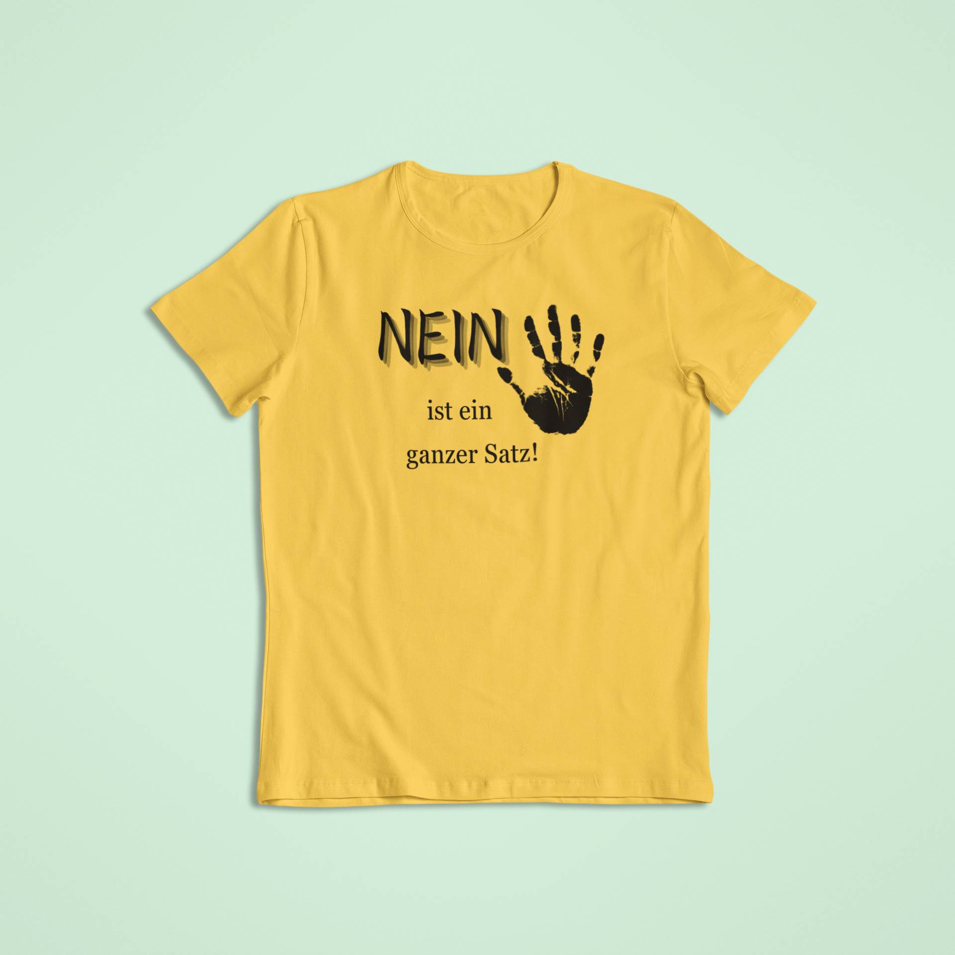 Gelbes Kindershirt mit der Botschaft „NEIN ist ein ganzer Satz!“ und schwarzem Handabdruck – ein starkes Statement für Selbstbestimmung und gesunde Grenzen im Kinderalltag.