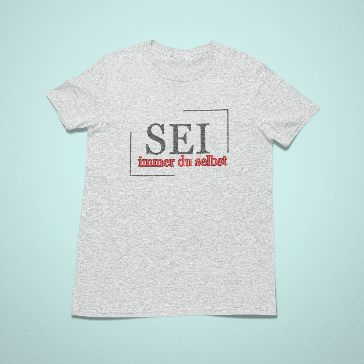 Kinderaffirmationsshirt in Heather Grey mit dem Aufdruck „SEI immer du selbst“ in schwarz-roter Schrift und geometrischem Rahmen.