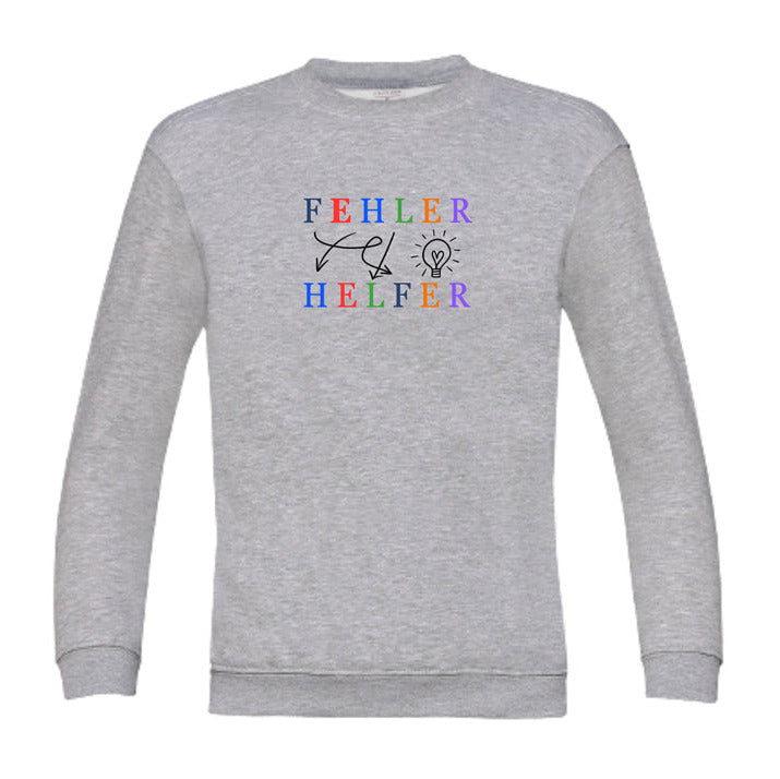 grauerKinder-Achtsamkeitssweatshirt mit der Botschaft „Fehler – Helfer“. Farbige Buchstaben, kreative Icons und kindgerechte Aussage – ideal für Schulstart, Mutmacher oder Geschenk.