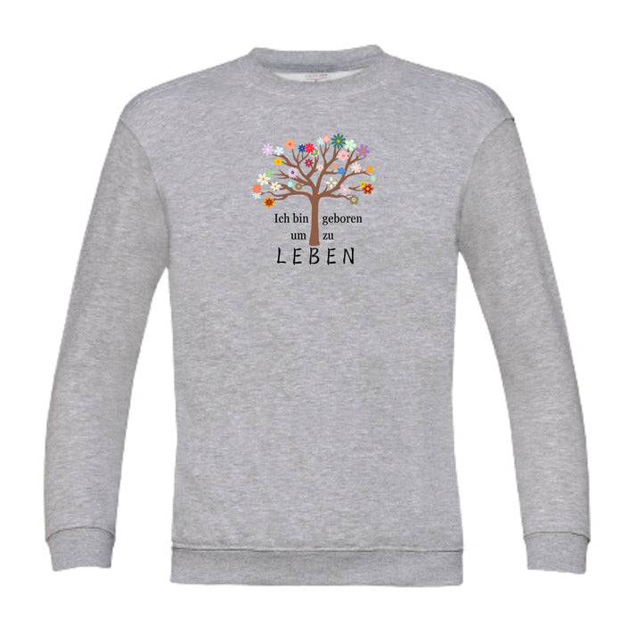 Achtsames Affirmationssweatshirt für Kinder mit Lebensbaum-Motiv und bestärkender Botschaft „Ich bin geboren, um zu leben“ – fair produziert & individuell bedruckt.
