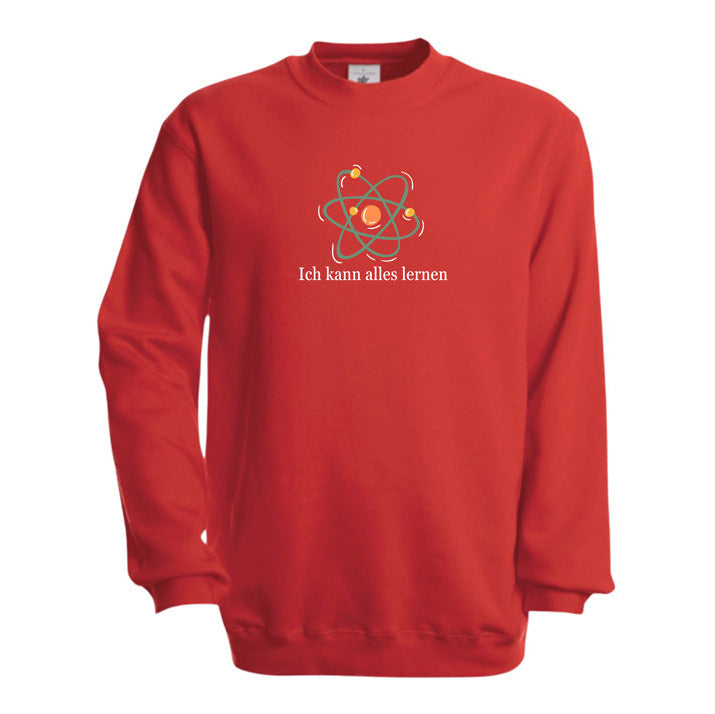 rote Kinder-Sweatshirt mit der Aufschrift „Ich kann alles lernen“ unter einer stilisierten bunten Atom-Grafik. Das Design vermittelt Neugier, Lernfreude und Wachstum.