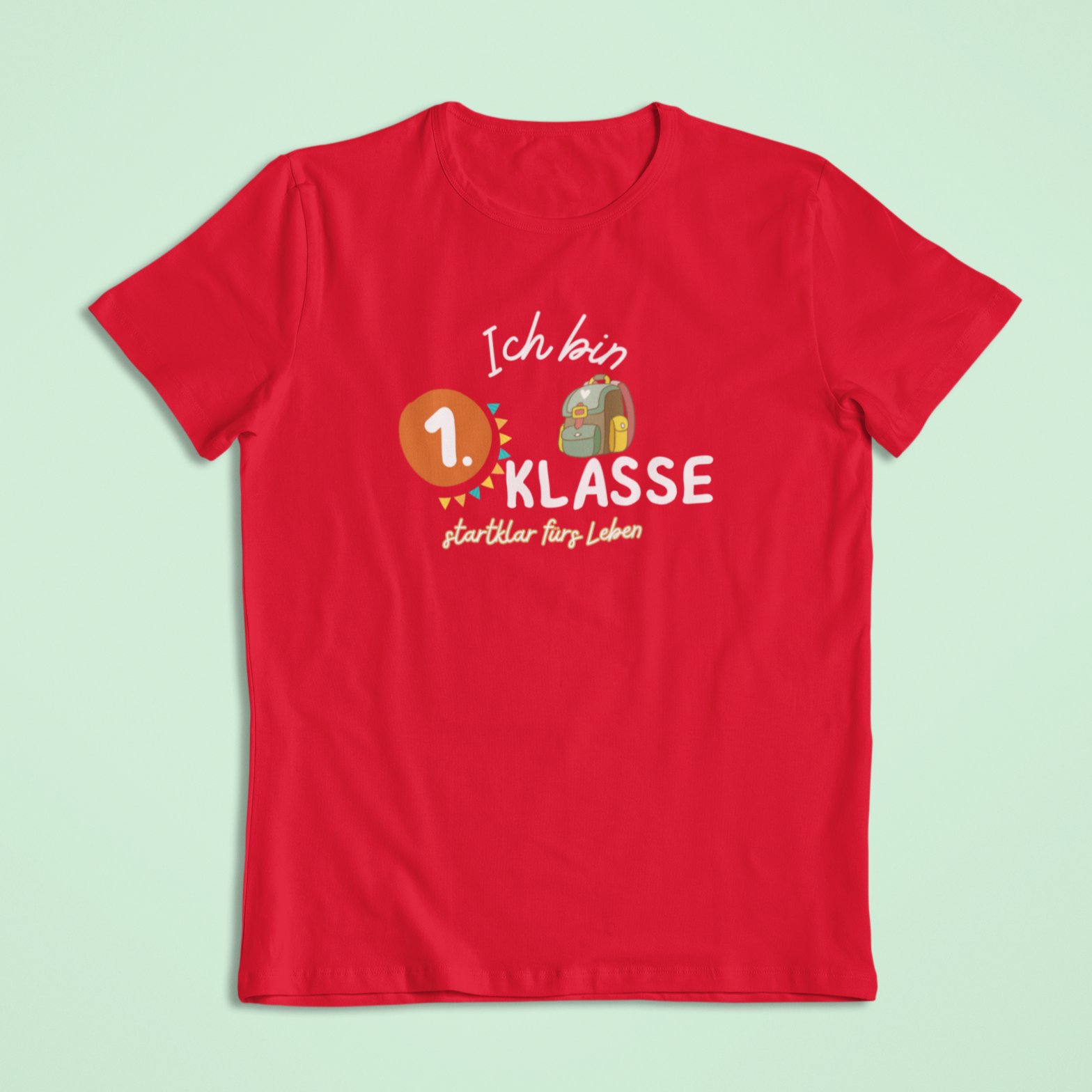 T-Shirt in Rot mit dem Aufdruck: Ich bin 1. Klasse – startklar fürs Leben. Bio-Einschulungs-T-Shirt von Sinachtsam