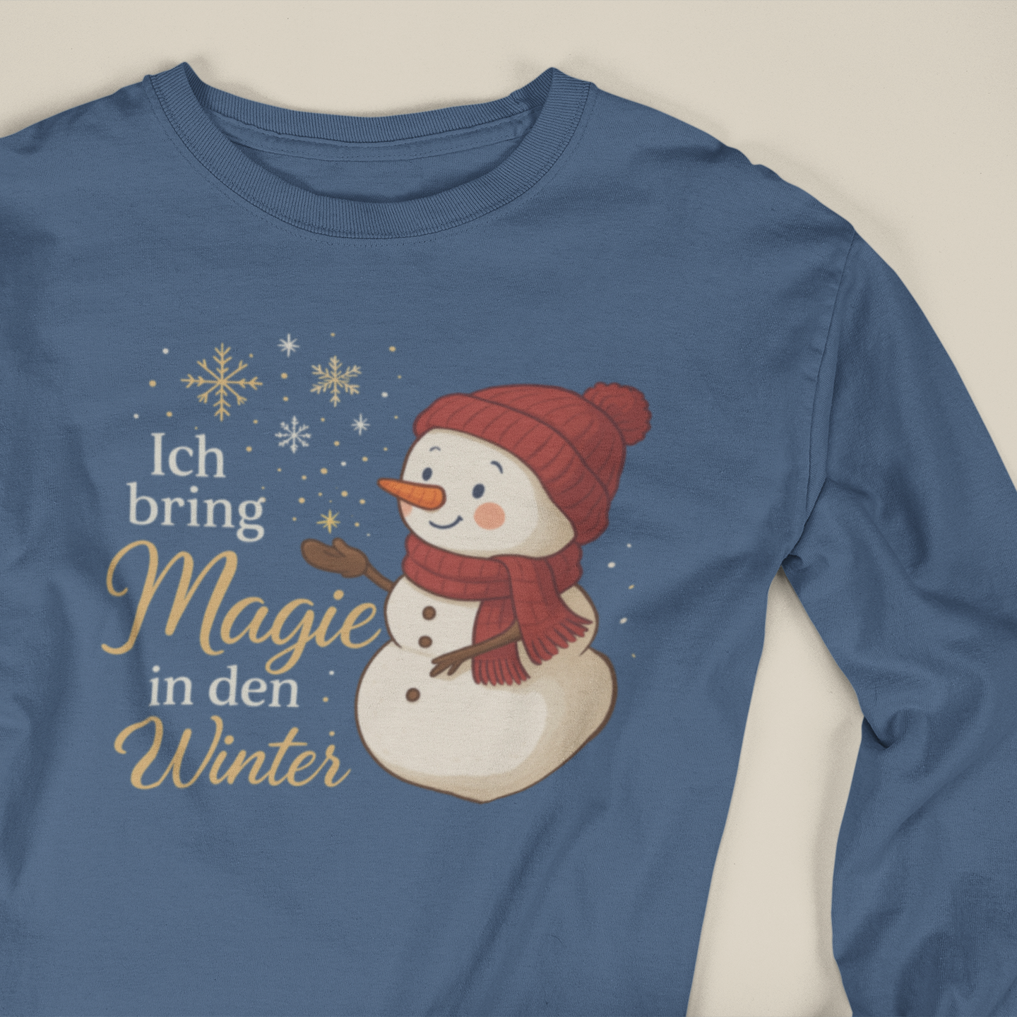 Kinder-Longsleeve in dunkelblau mit Schneemann-Motiv und der Affirmation „Ich bring Magie in den Winter“, ideal für die Winter- und Weihnachtszeit.
