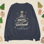 Navyfarbenes Weihnachtssweatshirt mit goldener Tannenbaum-Illustration und dem Text „Ich bin ein Geschenk – mit Liebe verpackt“, dekoriert mit Weihnachtskeksen und Zuckerstangen.